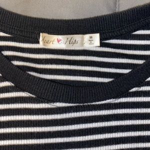 2 scallop neck and sleeve shirts.